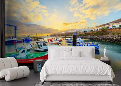 Sunset over a port in Gran Tarajal, Fuerteventura, Canary islands Wall mural