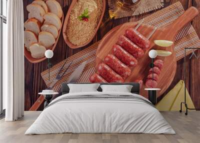 Grilled Sausage skewer on wooden board - Brazilian barbecue in top view Wall mural