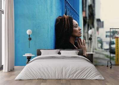 A black woman praying to God having HOPE and FAITH during hard times Wall mural