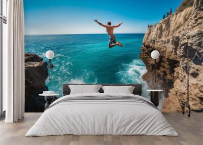 Cliff Jumping: A daring individual captured mid - leap off a towering cliff into turquoise ocean below, high adrenaline, natural sunlight Wall mural