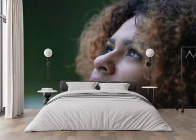 Black woman closing eyes during drizzle day. close-up Brazilian girl face opening eye to sky with HOPE Wall mural