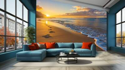 footprints in the sand of a beach at sunset Wall mural