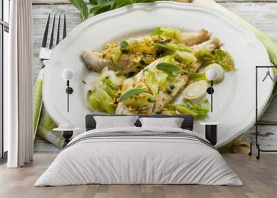 fish fillet with pistachio sage and leek Wall mural