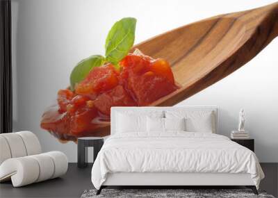 raw tomato pulp with basil over the spoon Wall mural