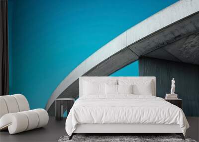 minimalistic curve concrete bridge with blue sky background Wall mural