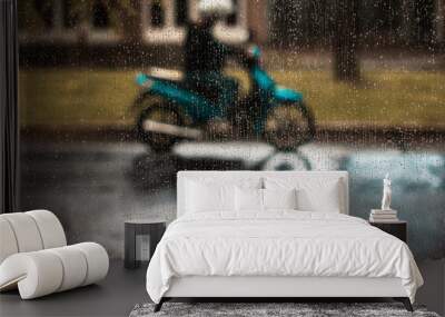 Motorcycle in the rain. Wall mural