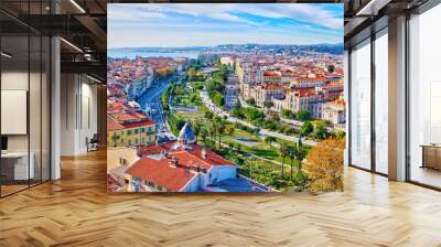 Nice, France - December 1, 2019: Colorful aerial panoramic view over the old town, with the famous Massena square and the Promenade du Paillon, from the roof of Saint Francis tower Wall mural