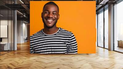 portrait of a black man on orange background Wall mural