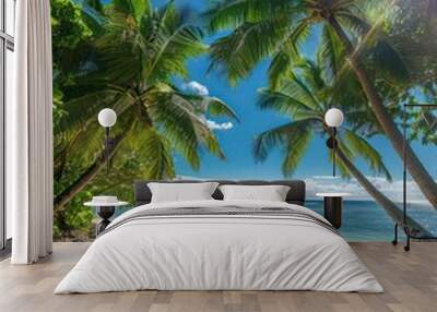 sandy beach landscape with palm trees and a beautiful blue sky Wall mural