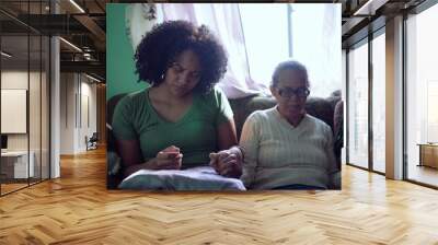 Spiritual Brazilian holdings hand praying at home having FAITH Wall mural