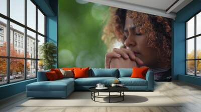 Spiritual woman praying to God Wall mural