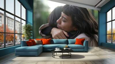 Sympathetic woman hugging friend with EMPATHY and SUPPORT. Friendship concept between two best friends Wall mural