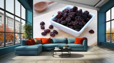 Raisins. Dry grape used in various foods Wall mural