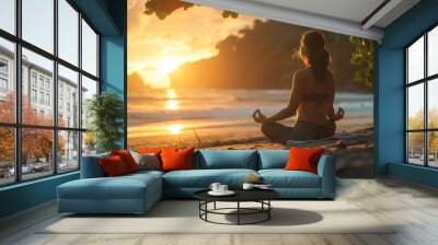 woman doing yoga on her back in front of the beach Wall mural