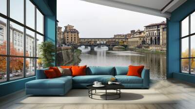 Ponte Vecchio the famous Arch bridge in Florence on Arno river, Tuscany, Italy Wall mural