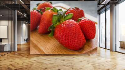 Fresh strawberries on wooden table Wall mural