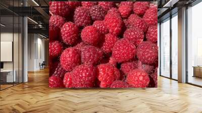 A bunch of red fresh tasty raspberries Wall mural