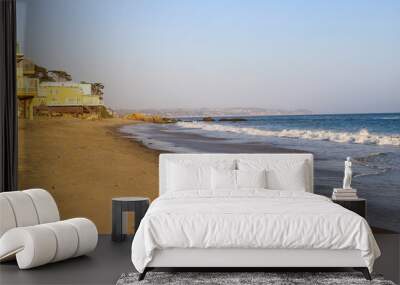 a view of the deep blue ocean and beach along the coastline at El Matador beach in Malibu California Wall mural