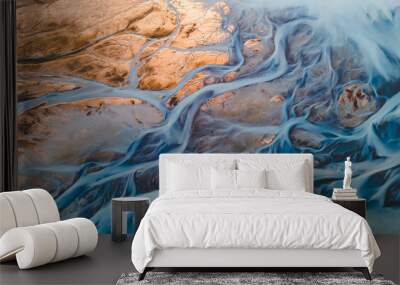 A glacial rivers from above. Aerial photograph of the river streams from Icelandic glaciers. Beautiful art of the Mother nature created in Iceland. Wallpaper background high quality photo Wall mural