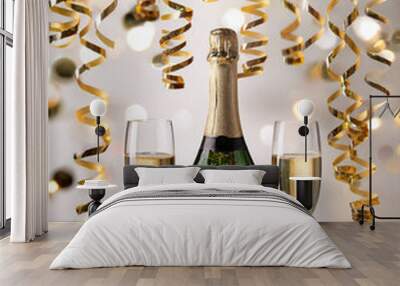 Champagne bottle and glasses with colorful background with confetti, celebration background with copy space, concept of celebration Wall mural