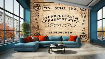 Ouija Board Planchette on wooden texture. Halloween play with calling souls and demons. Party poster. Graphic, caligraphy, typography, alphabet, letters, numbers.	 Wall mural