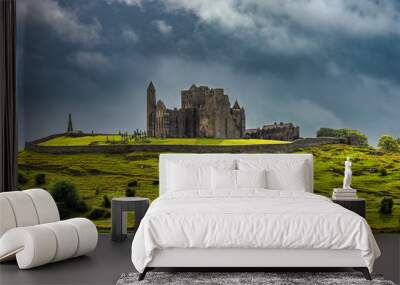 Rock of Cashel (irish Carraig Phadraig) - a complex of medieval sacred and defensive buildings in Cashel Wall mural