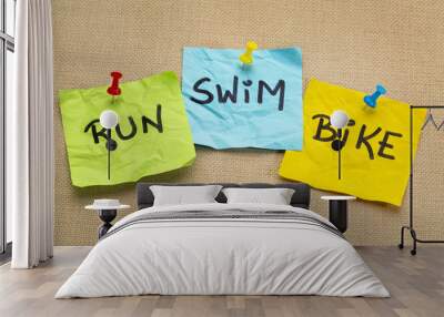 run, bike, swim - triathlon concept Wall mural