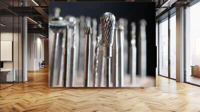 milling heads on a goldsmith workplace, macro shot of  jewelry tools against a dark background Wall mural