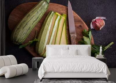 Fresh zucchini on cutting board, healthy vegetable meal Wall mural