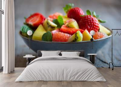 Fruit salad with cut fresh fruit and mint Wall mural