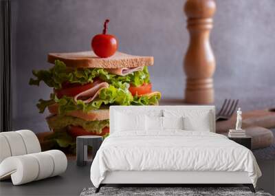 Homemade sandwich with cheese, ham, tomatoes and vegetables Wall mural