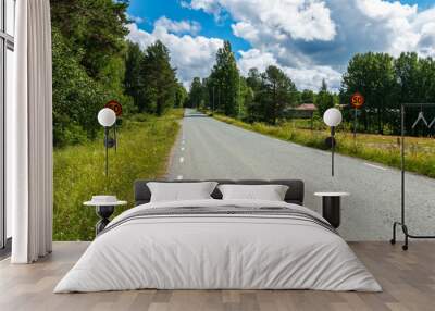 Sweden/Main road through the small Swedish village of Nordmark on a beautiful sunny day Wall mural