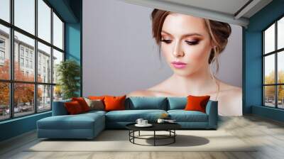 Fashion model posing at studio with makeup Wall mural