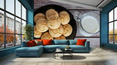 
There is a bowl of delicious cookies on the table. Wall mural