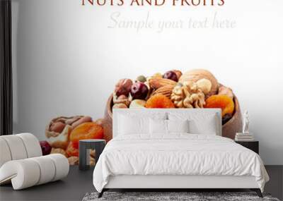 Dry nuts with dry fruits on white backgrounds Wall mural