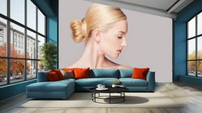 Fashion blonde woman with beautiful face - isolated on white. Skin care concept. Wall mural