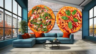 Hot delicious pizzas, top view. Wall mural