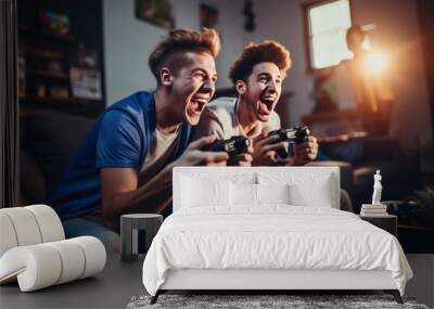 Two friends sit side by side on a couch, each with a gaming controller in hand Wall mural