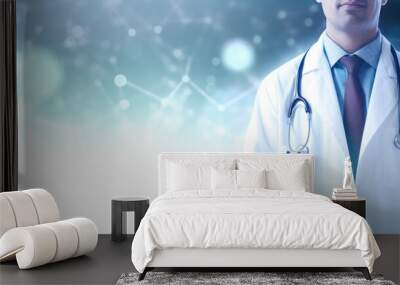 Young doctor standing with arms crossed on blue abstract background. Wall mural