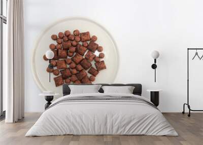 children's dry chocolate breakfast balls and pads in a decorative ceramic plate Wall mural