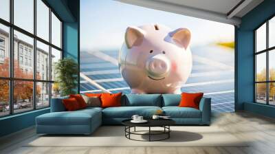 Renewable Energy Savings - Piggy bank on solar panel system, blurred industrial setting.
 Wall mural