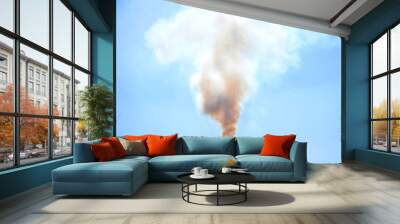 silhouette of a pipe with smoke background sky sun backlight, Blue colour Wall mural