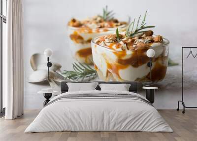 Dessert bowl with tasty caramel parfait on table. Wall mural