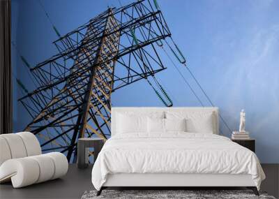 Electricity transmission tower against blue sky. Wires, insulators.  Wall mural