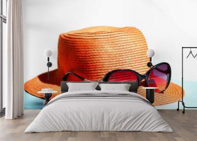 Female orange straw hat and sunglasses for beach holiday  Wall mural