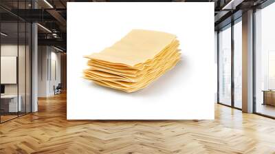 Lasagna sheets in stack. Uncooked lasagna pasta isolated on white background. Clipping path. Wall mural