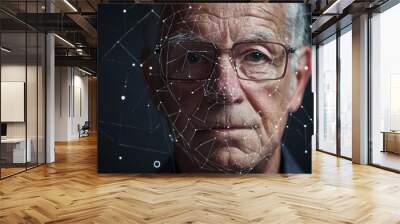 Facial recognition technology concept: close-up of senior man's face with digital mesh overlay, illustrating AI and biometric scanning advancements. Wall mural