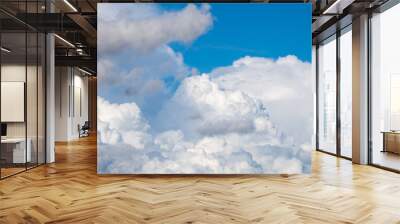 white cumulus clouds in the blue sky Wall mural