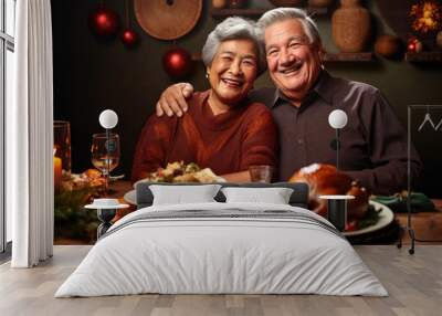 Portrait of couple of seniors having dinner with turkey celebrating Thanksgiving Day. Wall mural