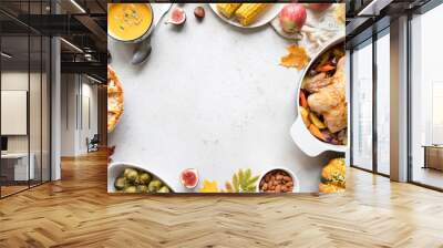 Thanksgiving dinner with chicken, apple pie, pumpkin soup brussel sprouts and fruits. Wall mural